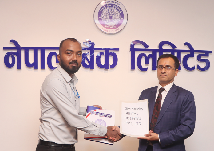 नेपाल बैंकका ग्राहक र कर्मचारीलाई ॐ समाज डेन्टल अस्पतालमा छुट